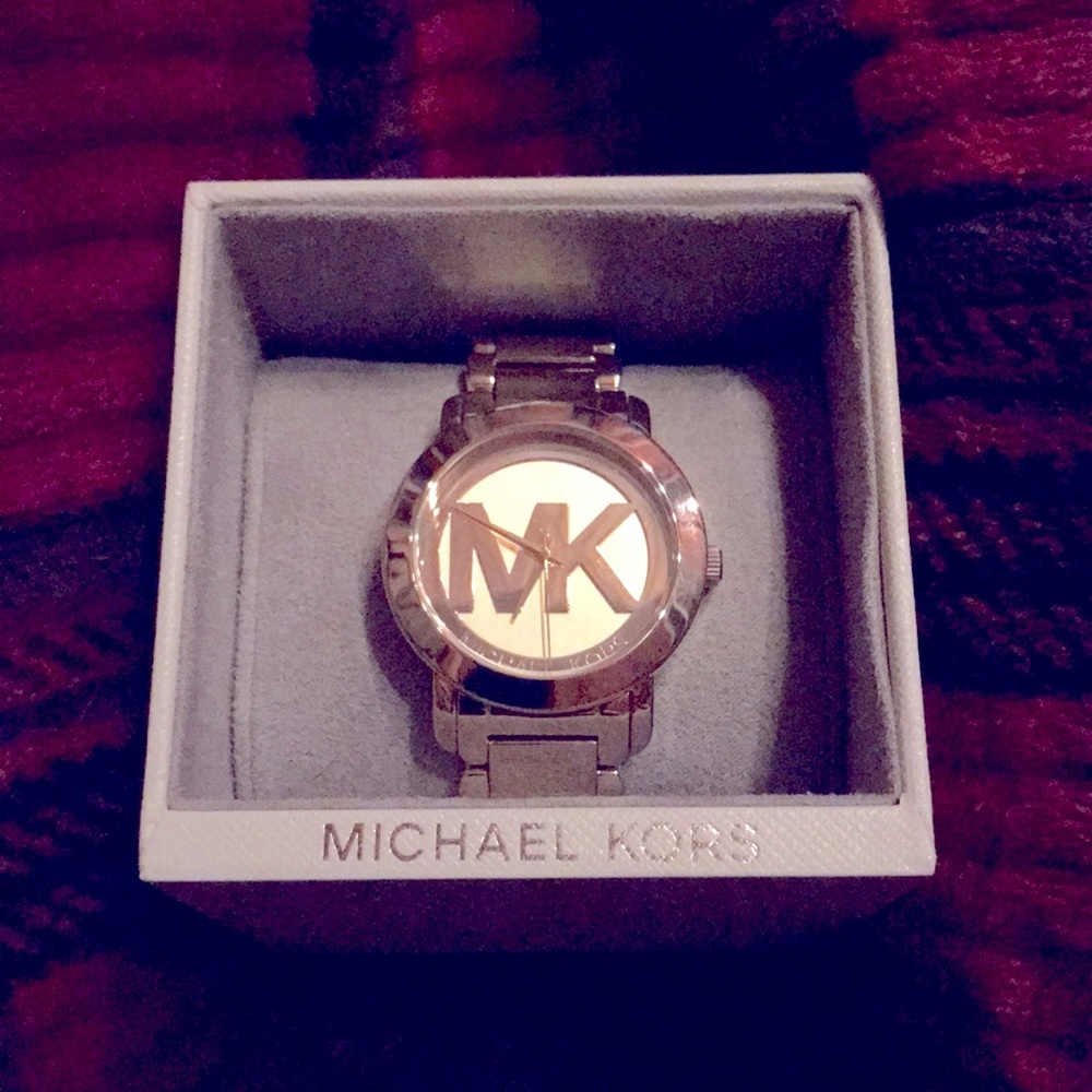 Michael Kors gold watch- women’s